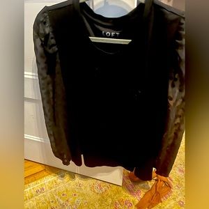 Black long sleeve sheer sleeve top with polka dots on sleeve. Good used cond